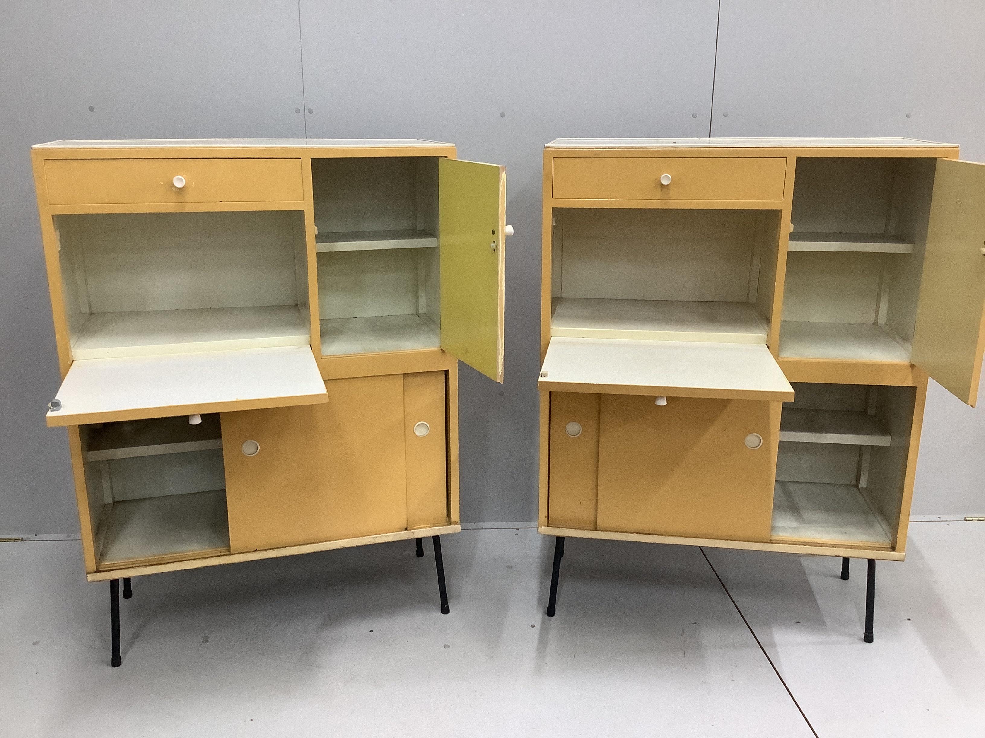 A pair of 1960's melamine household cabinets, each width 91cm, depth 41cm, height 127cm